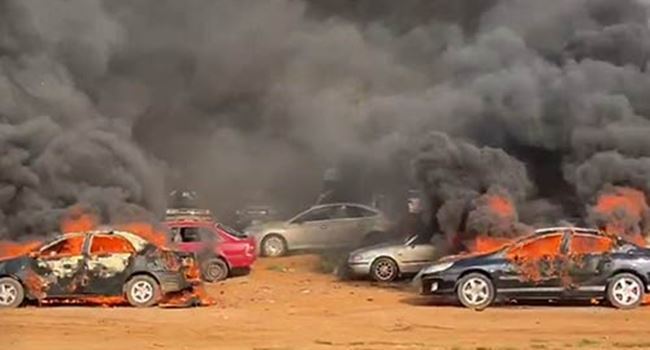 Hoodlums Attack EndSARS Protesters, Set Cars Ablaze In Abuja