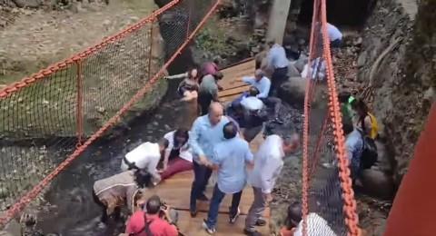 Bridge collapses during its opening ceremony sending mayor and guests into river