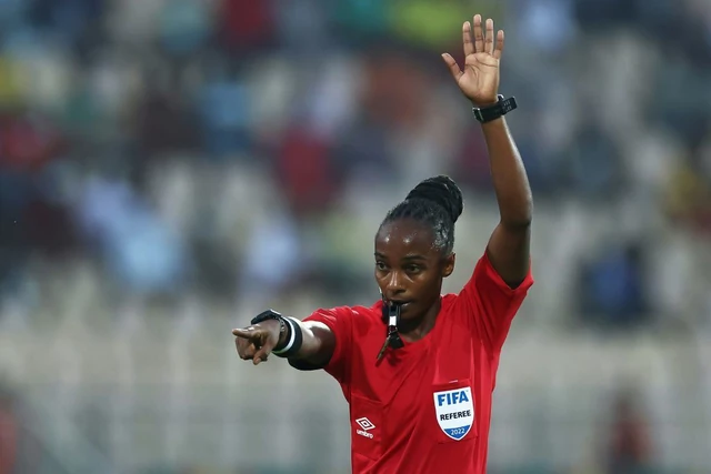 History-making Rwandan referee Salima Mukansanga gestures during an Africa Cup of Nations Group B match between Zimbabwe and Guinea in Yaounde on Tuesday. 