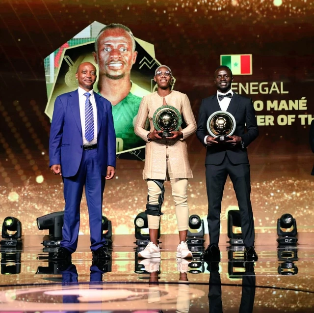 CAF President Patrice Motsepe with 2022 Women and Men's African Player of the Year, Asisat Oshoala and Sadio Mane