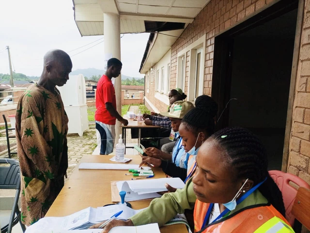 An Osun voter getting set to cast his vote.