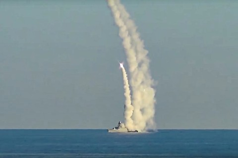 Long-range Kalibr cruise missiles launched by a Russian military ship from an unknown location