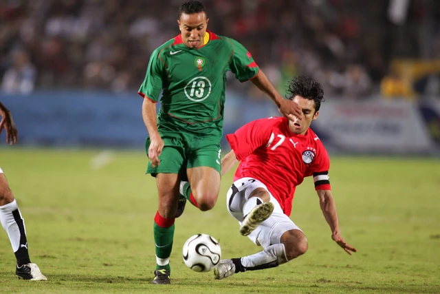 The most capped African player of all time, Ahmed Hassan in action against Morocco at the 2006 AFCON