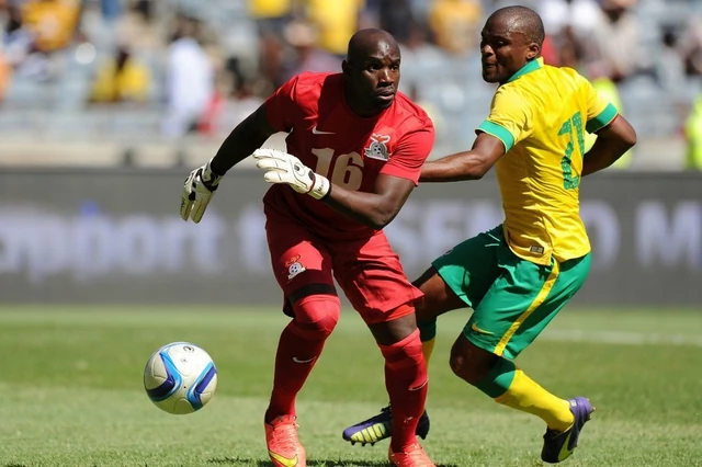 Kennedy Mweene (L) playing for Zambia against South Africa in a friendly match in Johannesburg
