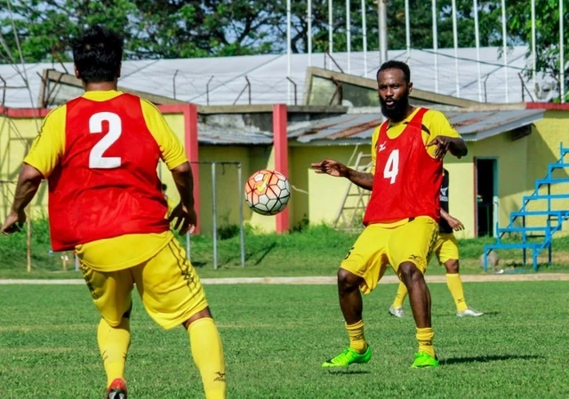 Former Tottenham Hotspur midfielder Didier Zokora (R), seen during a practice session in Padang, West Sumatra, in April 2017
