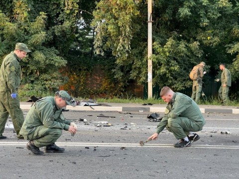 There was debris scattered around and a fireball in the background