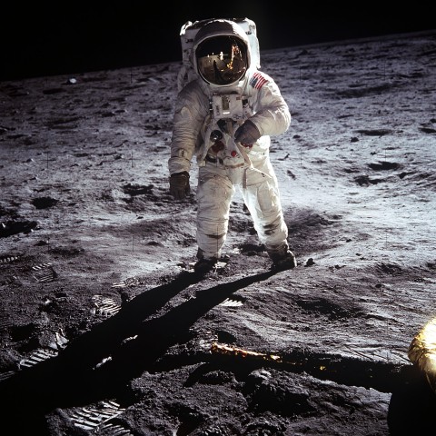 Astronaut Buzz Aldrin walks on the surface of the moon near the leg of the lunar module Eagle during the Apollo 11 mission