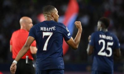 Kylian Mbappe celebrates after scoring a goal for PSG against Juventus in the Champions League