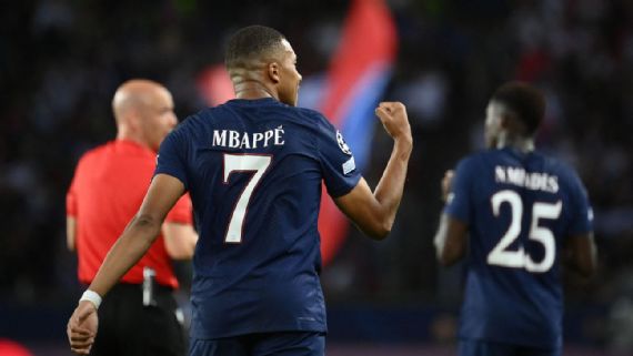 Kylian Mbappe celebrates after scoring a goal for PSG against Juventus in the Champions League