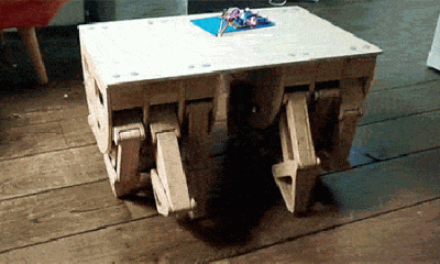 Watch this walking table with 12 legs