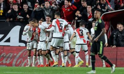 Rayo Vallecano players celebrate after scoring a goal against Real Madrid in LaLiga