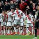 Rayo Vallecano players celebrate after scoring a goal against Real Madrid in LaLiga