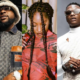 Fans split on Davido, Wizkid, and Burna Boy's Grammy nominations.